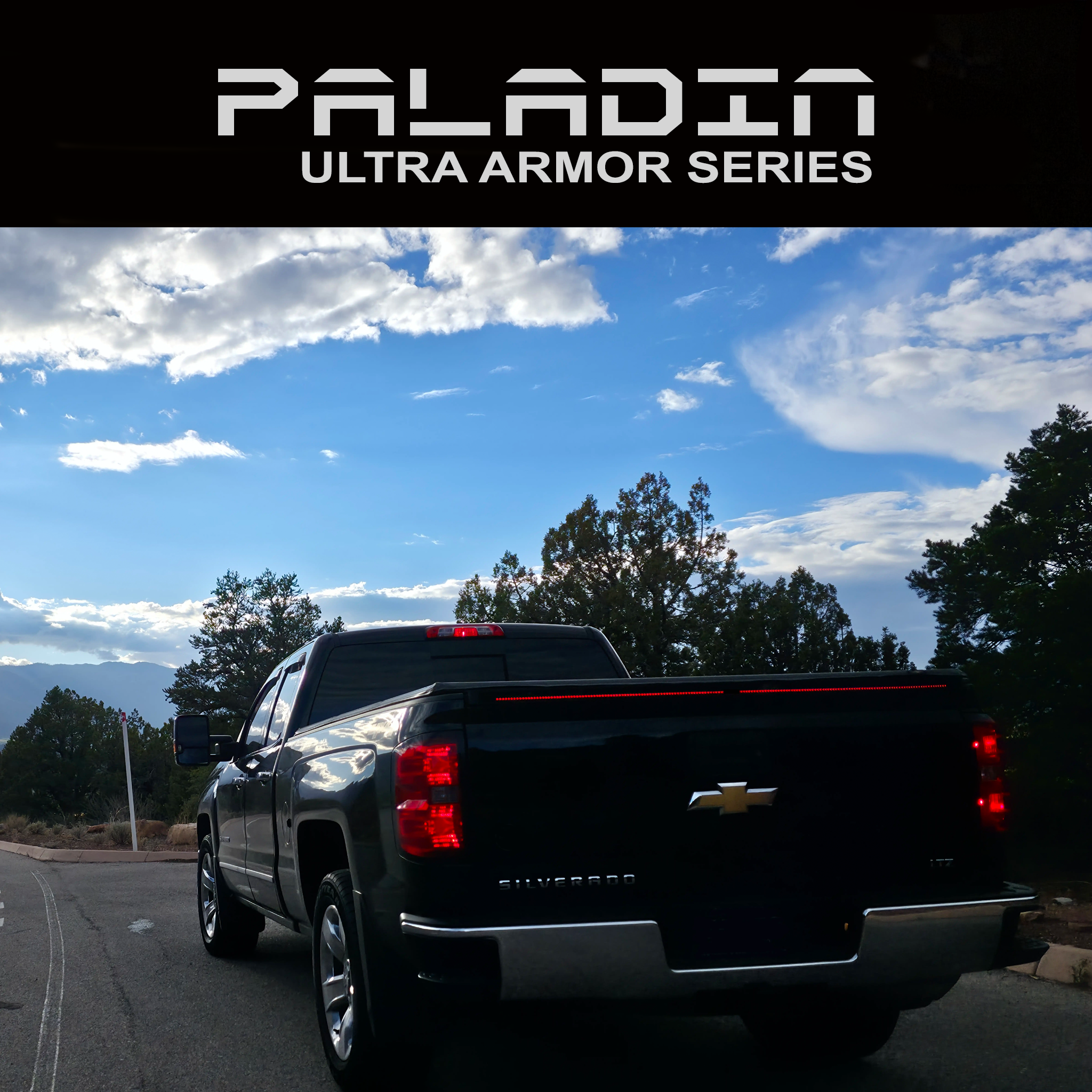 Chevy Silverado 2014–2018 with PSM PALADIN LED tailgate protector from the ULTRA ARMOR series.